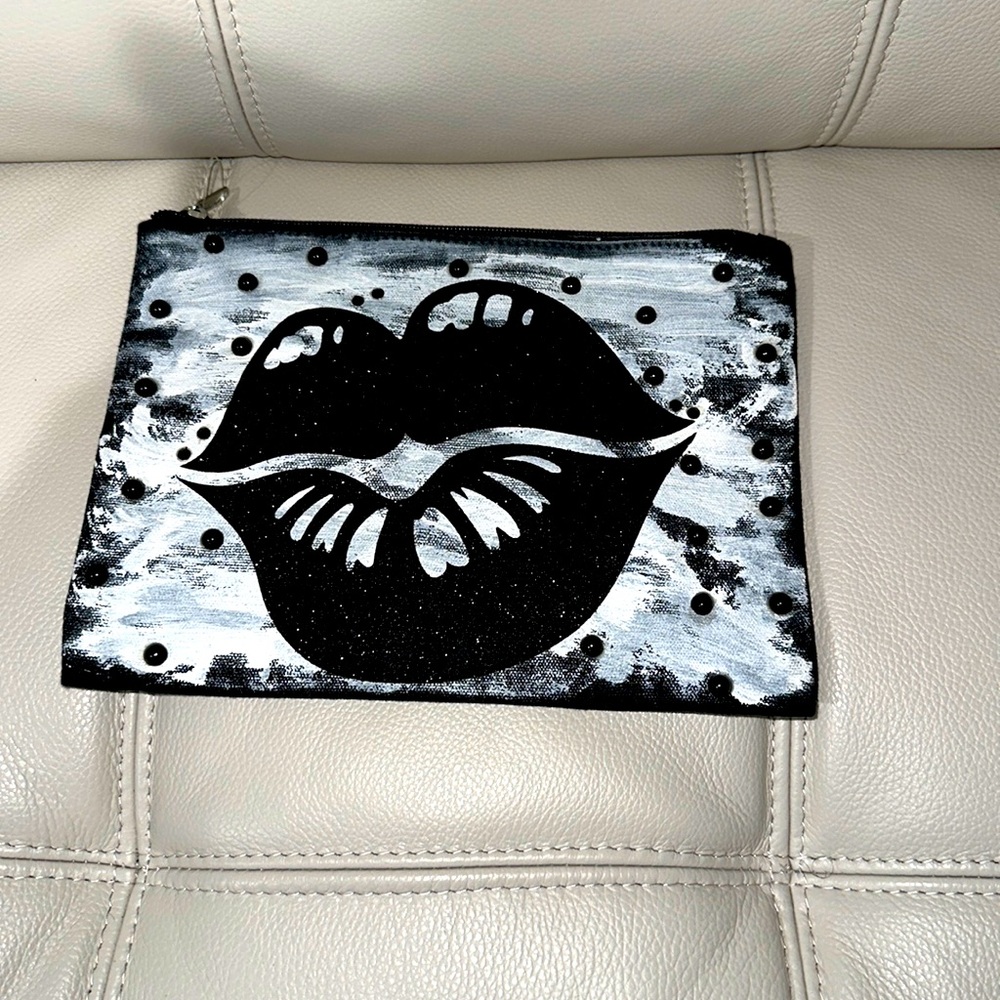 Clutch painted handbag